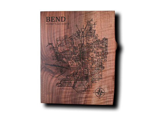 Wooden plaque with engraved map and 'Bend' text on a white background