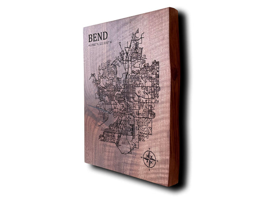 Wooden plaque with engraved map and 'Bend' text on a white background