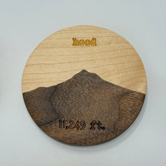 A wooden coaster on a white background.