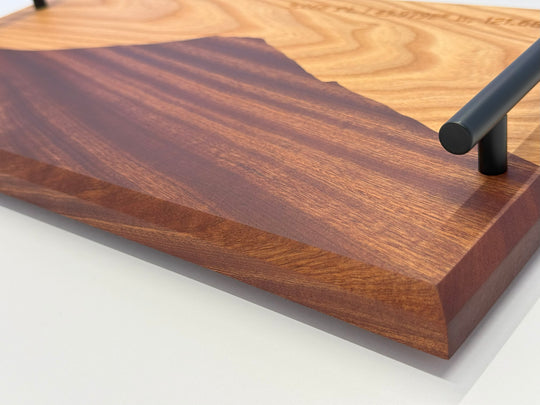 A wooden platter on a white background.