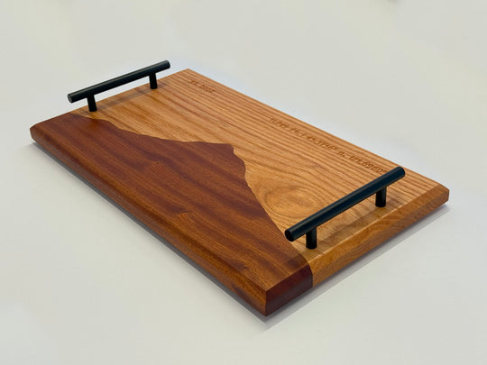A wooden platter on a white background.