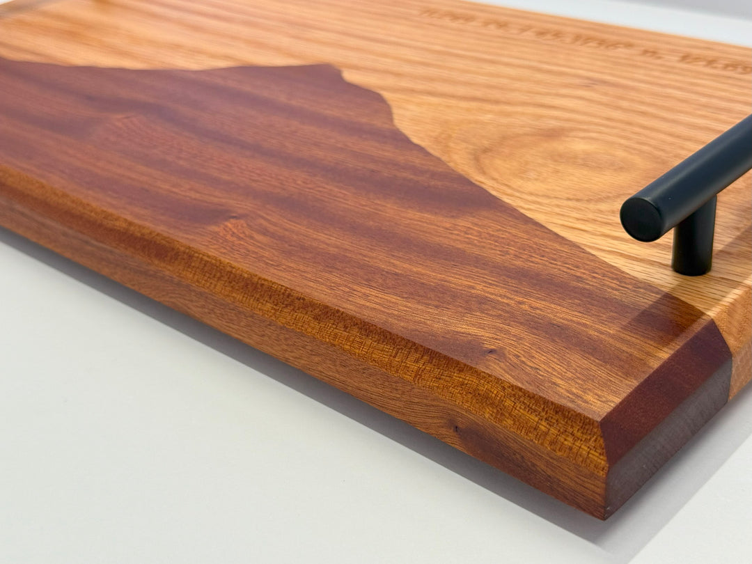 A wooden platter on a white background.