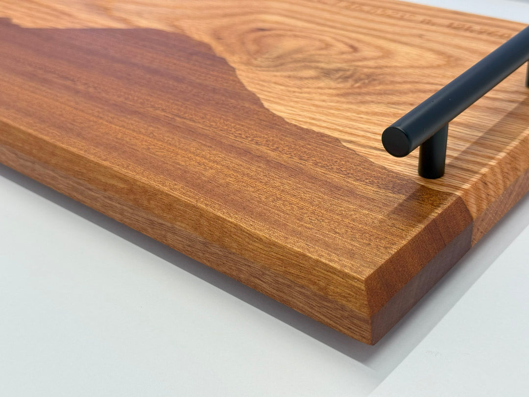 A wooden platter on a white background.