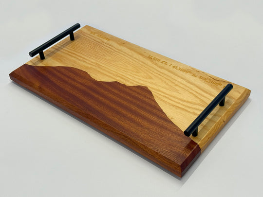 A wooden platter on a white background.