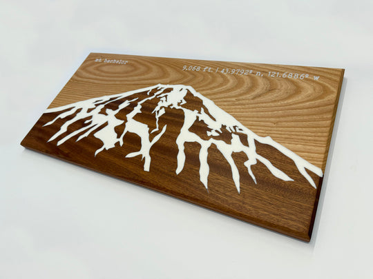 Wooden wall art on a white background.