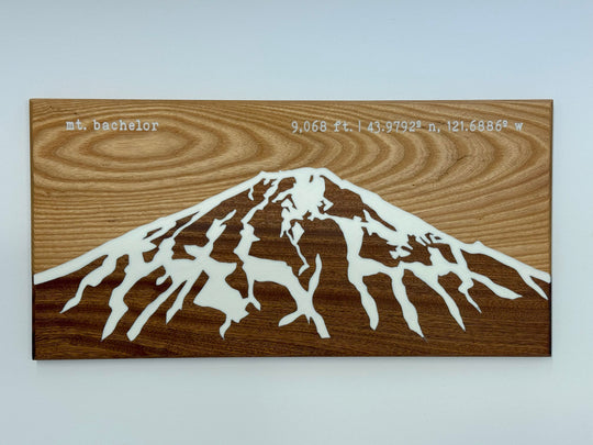 Wooden wall art on a white background.