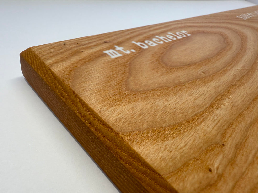 Wooden wall art on a white background.