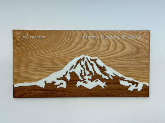 Wooden wall art on a white background.