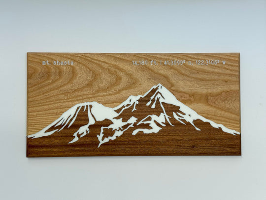 Wooden wall art on a white background.